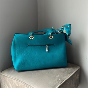 Cute, medium size, handbag.